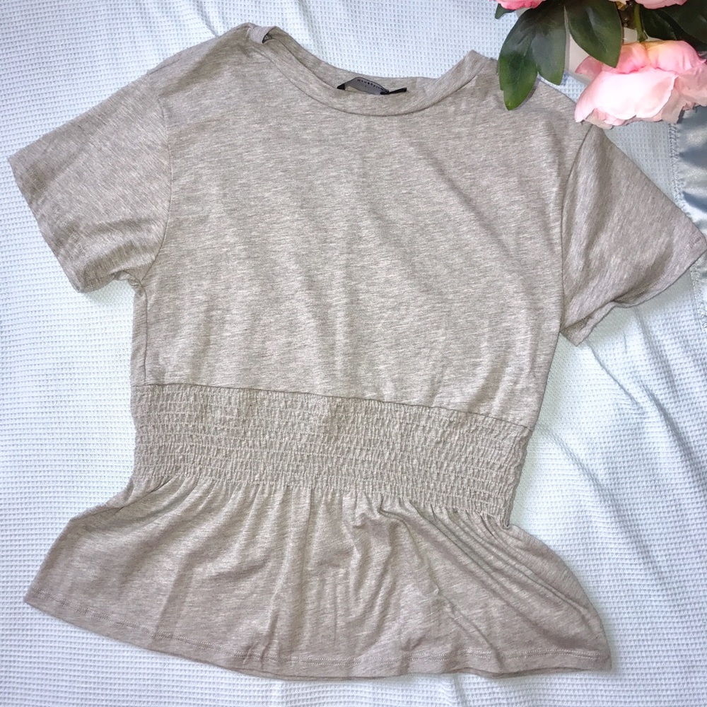 Gray tee shirt cinched  detail on the waist